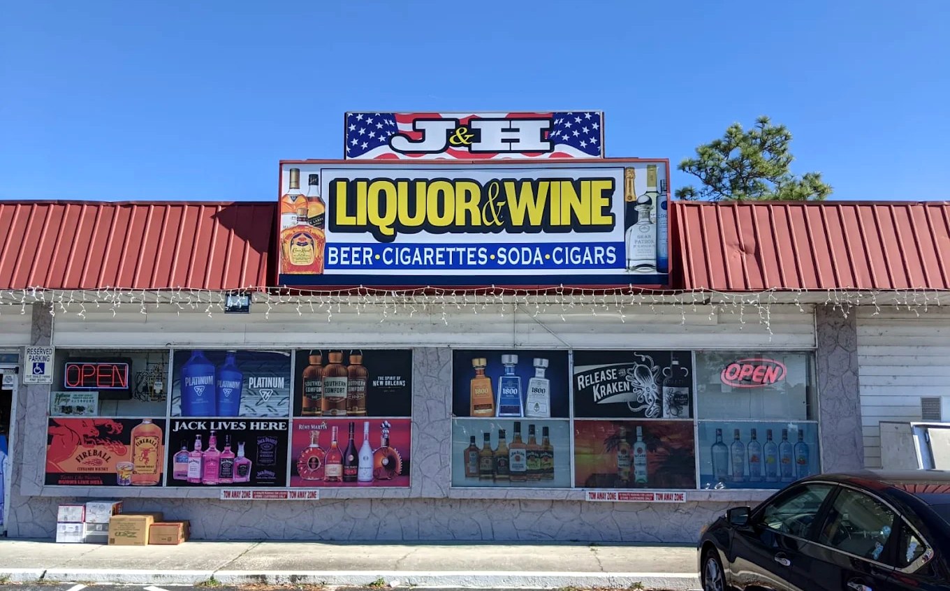 J and H Liquor storefront at 7232 Brookridge Central Boulevard in Brooksville, Florida